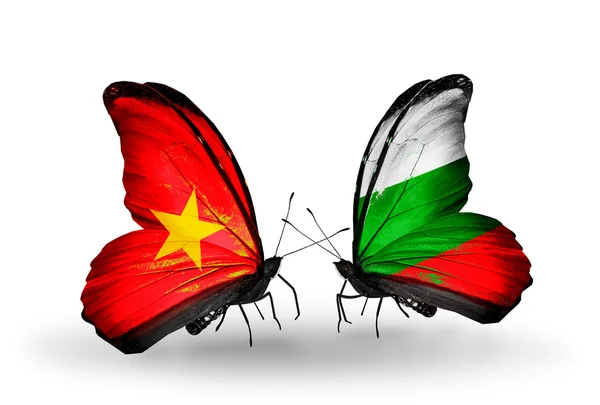Butterflies with Vietnam and Bulgaria flags on wings — Stock Photo, Image