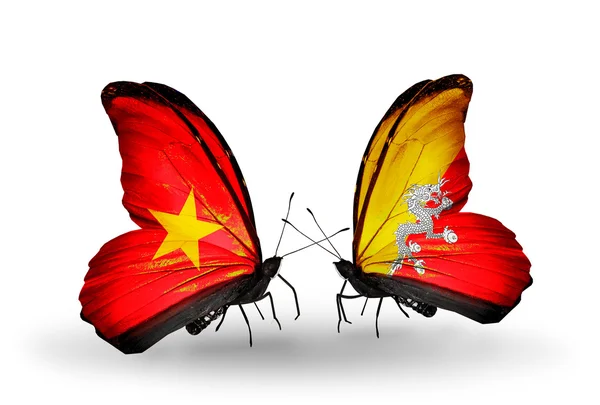 Papillons avec drapeaux du Vietnam et du Bhoutan sur les ailes — Photo