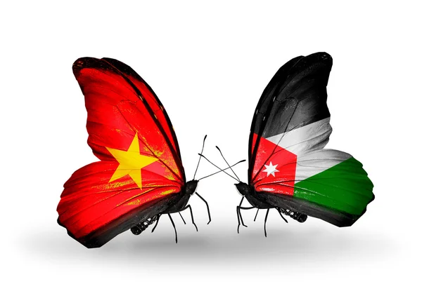 Deux papillons avec des drapeaux du Vietnam et de la Jordanie — Photo