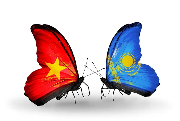 Deux papillons avec des drapeaux du Vietnam et du Kazakhstan — Photo