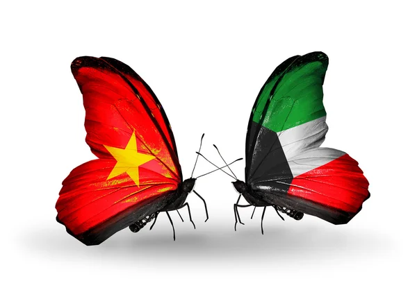Twee vlinders met vlaggen van vietnam en Koeweit — Stockfoto