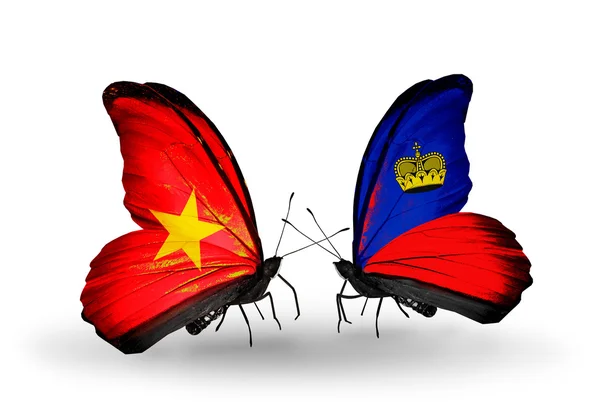 Deux papillons avec des drapeaux du Vietnam et du Liechtenstein — Photo