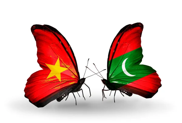 Två fjärilar med flaggor av vietnam och Maldiverna — Stockfoto