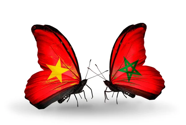 Duas borboletas com bandeiras do Vietnã e Marrocos — Fotografia de Stock