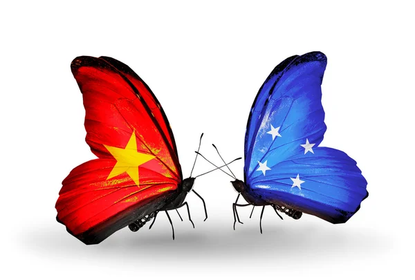 Dos mariposas con banderas de Vietnam y Micronesia —  Fotos de Stock