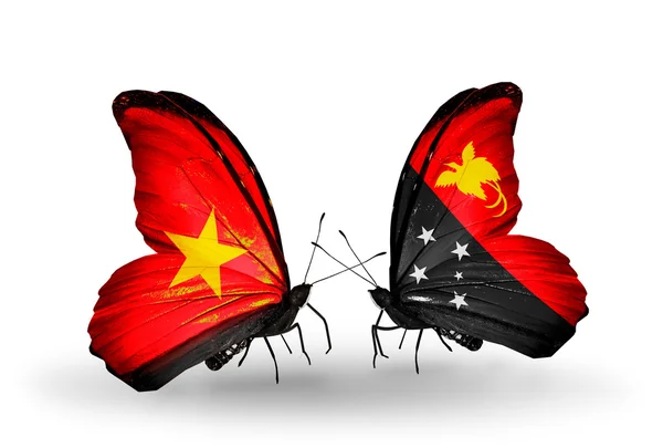 Duas borboletas com bandeiras do Vietnã e Papua Nova Guiné — Fotografia de Stock