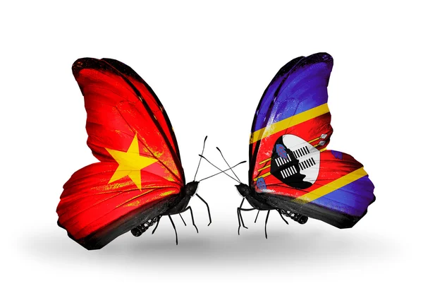 Deux papillons avec des drapeaux du Vietnam et Sainte-Lucie — Photo