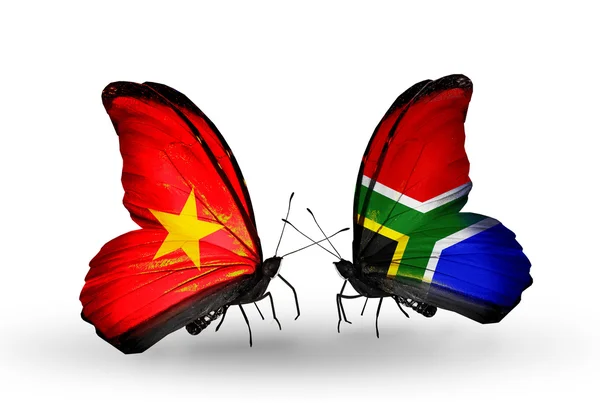 Twee vlinders met vlaggen van vietnam en Zuid-Afrika — Stockfoto