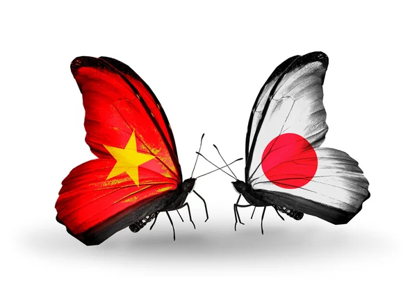 Dos mariposas con banderas de Vietnam y Japón —  Fotos de Stock