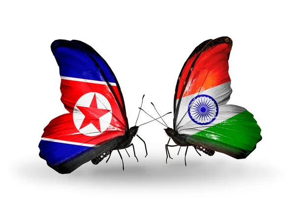 Butterflies with North Korea and India flags on wings — Stock Photo, Image