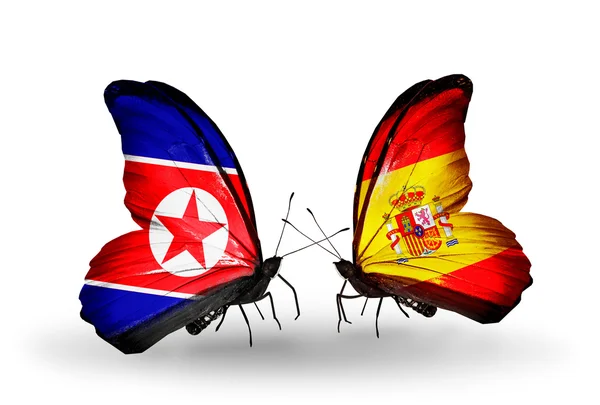 Motyle z Korei Północnej i Hiszpanii flagi na skrzydłach — Zdjęcie stockowe