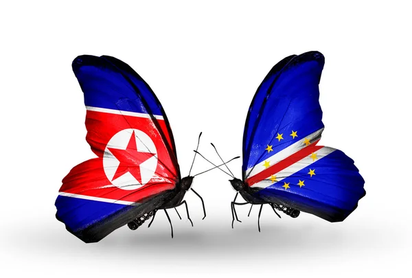 Vlinders met Noord-korea en Kaapverdië vlaggen op vleugels — Stockfoto