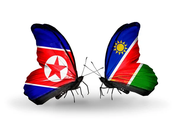 Butterflies with North Korea and Namibia flags on wings — Stock Photo, Image
