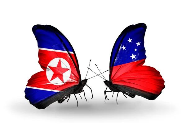 Kuzey Kore ve samoa bayrakları kanatlar üzerinde kelebekler — Stok fotoğraf