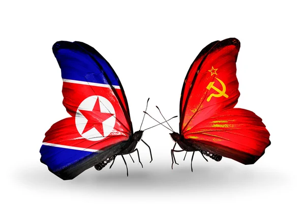 Butterflies with North Korea and Soviet Union flags on wings — Stock Photo, Image