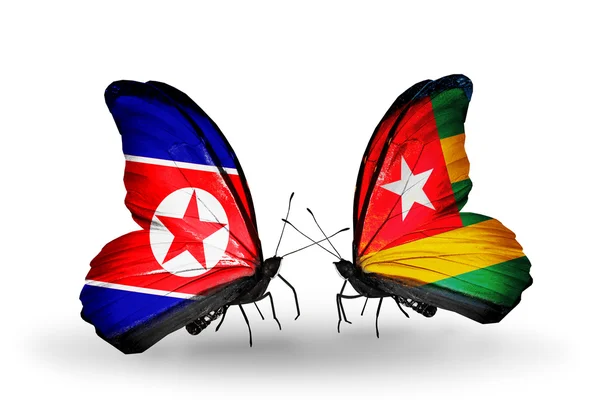 Butterflies with North Korea and  Togo flags on wings — Stock Photo, Image