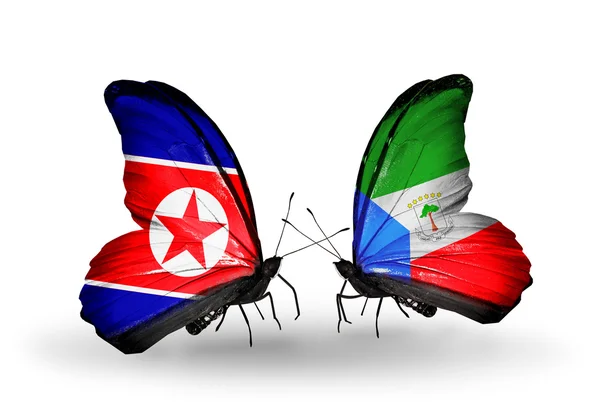 Butterflies with North Korea and Equatorial Guinea flags on wings — Stock Photo, Image