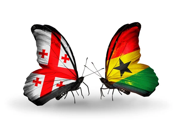 Mariposas con banderas de Georgia y Ghana en alas — Foto de Stock