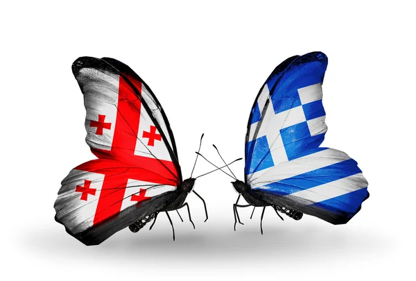 Butterflies with Georgia and Greece islands flags on wings — Stock Photo, Image