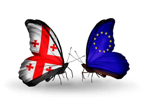 Butterflies with Georgia and European Union islands flags on wings — Stock Photo, Image