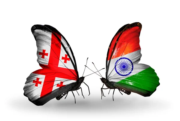 Mariposas con banderas de Georgia e India en alas —  Fotos de Stock