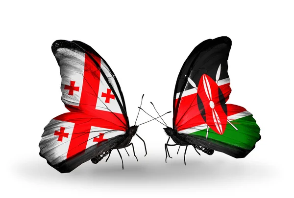 Butterflies with Georgia and Kenya islands flags on wings — Stock Photo, Image