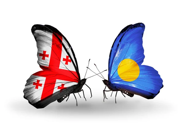 Kelebek kanatları üzerinde Gürcistan ve palau bayraklı — Stok fotoğraf