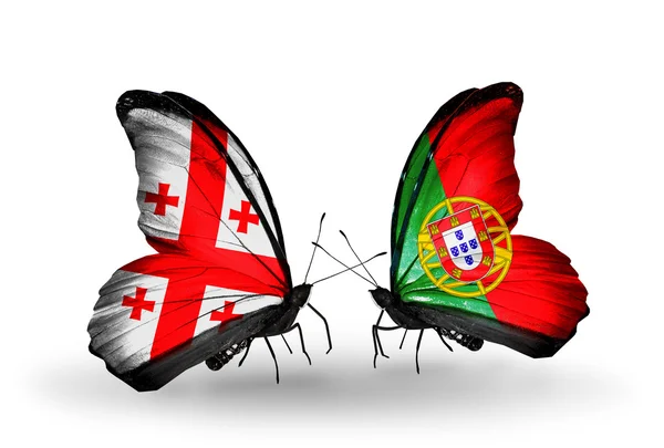 Mariposas con banderas de Georgia y Portugal en alas — Foto de Stock