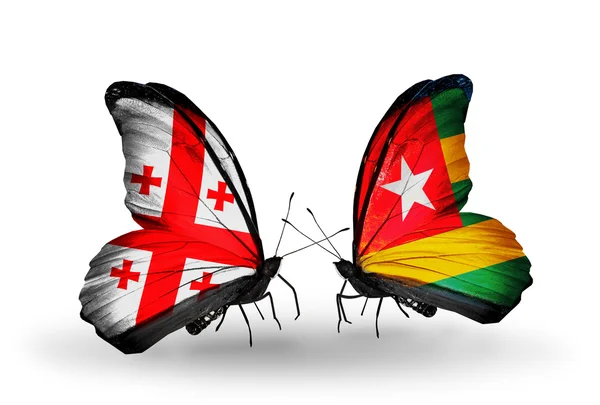 Mariposas con banderas de Georgia y Togo en alas —  Fotos de Stock