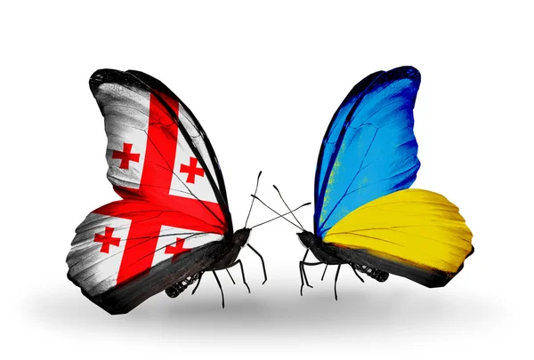 Butterflies with Georgia and Ukraine flags on wings — Stock Photo, Image