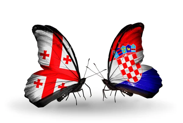 Papillons avec la Géorgie et la Croatie drapeaux sur les ailes — Photo