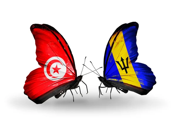 Fluturi cu steaguri Tunisia și Barbados pe aripi — Fotografie, imagine de stoc