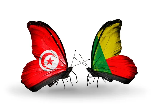 Farfalle con bandiere Tunisia e Benin sulle ali — Foto Stock