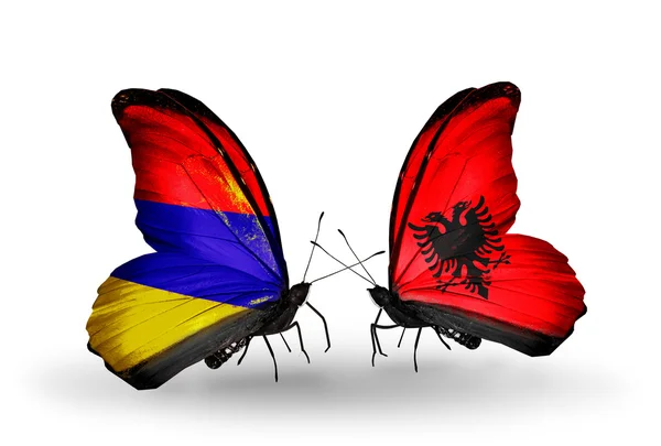 Mariposas con banderas de Armenia y Albania en alas — Foto de Stock