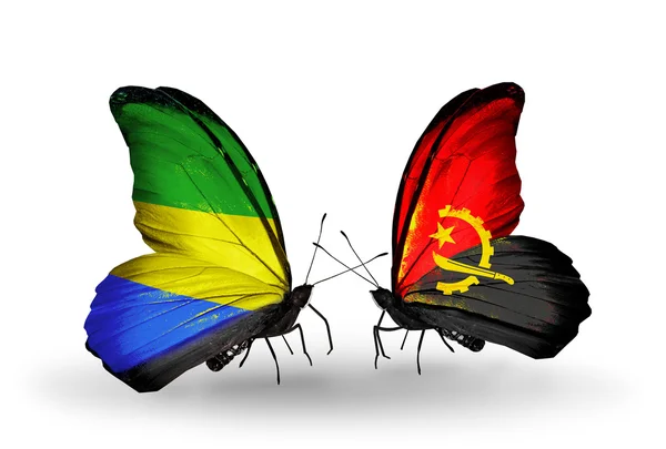 Butterflies with Gabon and  Angola flags on wings — Stock Photo, Image