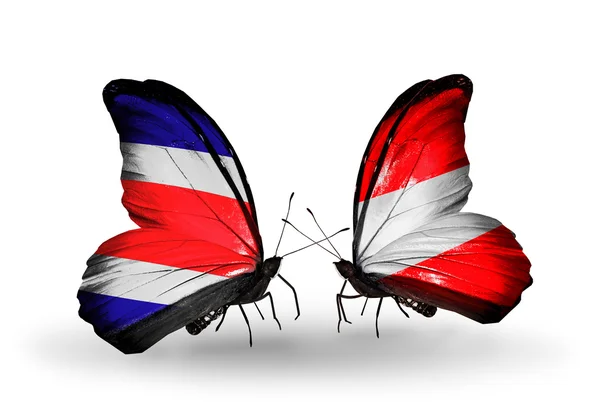 Butterflies with Costa Rica and Austria flags on wings — Stock Photo, Image