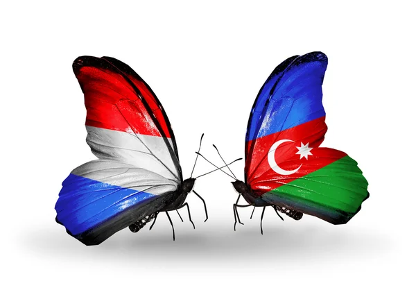 Butterflies with  Luxembourg and Azerbaijan flags on wings — Stock Photo, Image