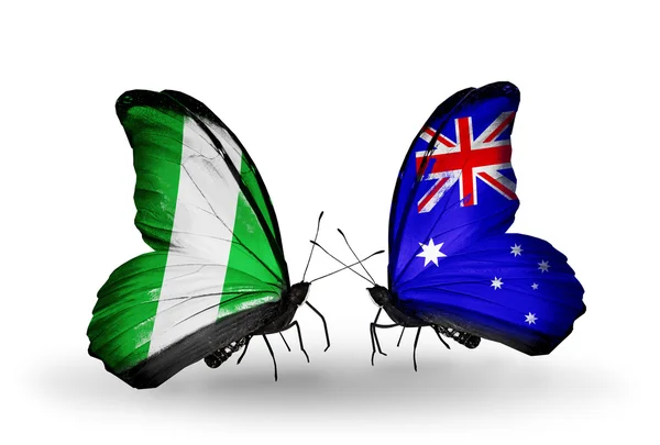 Butterflies with Nigeria and Australia flags on wings — Stock Photo, Image