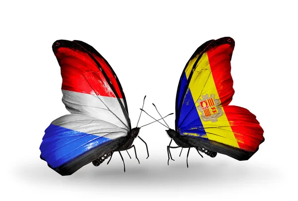 Butterflies with Luxembourg and Andorra flags on wings — Stock Photo, Image