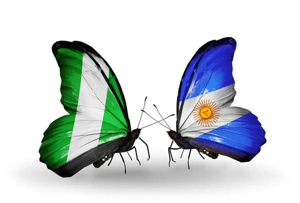 Butterflies with  Nigeria and Argentina flags on wings — Stock Photo, Image