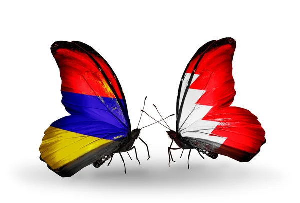 Butterflies with Armenia and  Bahrain flags on wings — Stock Photo, Image