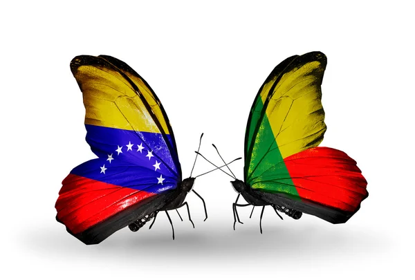 Papillons avec drapeaux du Venezuela et du Bénin sur les ailes — Photo