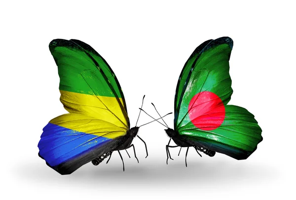 Papillons avec drapeaux du Gabon et du Bangladesh sur les ailes — Photo