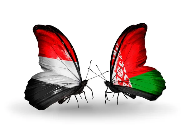 Mariposas con banderas de Yemen y Bielorrusia en alas — Foto de Stock