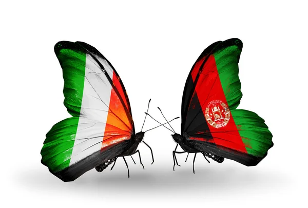 Schmetterlinge mit iranischen und afghanischen Flaggen auf Flügeln — Stockfoto