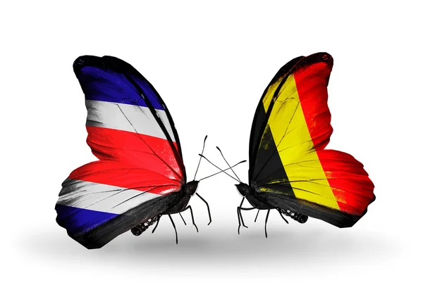 Mariposas con banderas de Costa Rica y Bélgica en alas — Foto de Stock