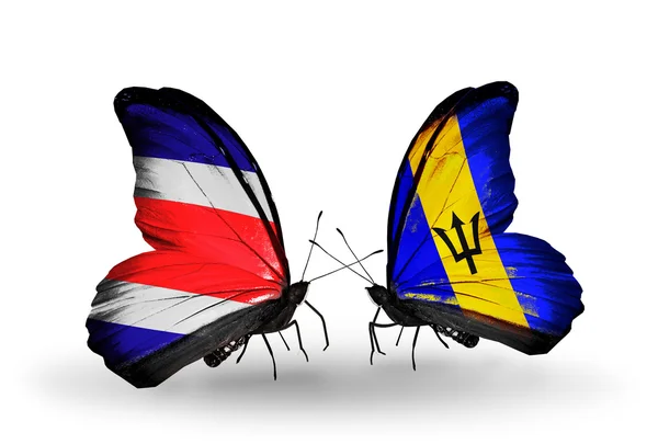 Mariposas con banderas de Costa Rica y Barbados en alas — Foto de Stock