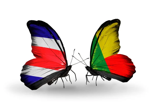 Papillons avec drapeaux du Costa Rica et du Bénin sur les ailes — Photo