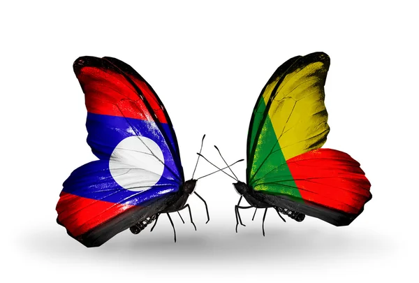 Kelebek kanatları üzerinde laos ve benin bayraklı — Stok fotoğraf