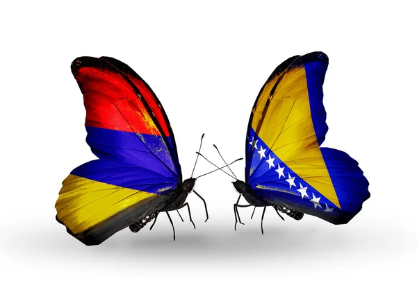 Mariposas con banderas de Armenia y Bosnia y Herzegovina en alas — Foto de Stock